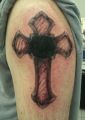 cross tattoo on arm for men