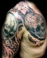 skulls tattoos on shoulders