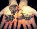 ptak tatuaż na dwóch dłoniach