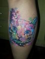 kolowy kot tatuaż