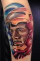 Iron Man tattoo on calf