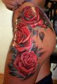 amazing rose tattoo on hip