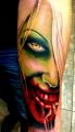 green face zombie tattoo