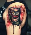 Joker shoulder tattoo