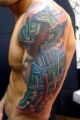 biomechanic arm tattoo