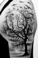 tree moon tattoo on arm