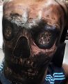 amazing big skull tattoo on back