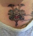 samurai on chest tattoo