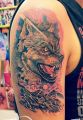 wolf tattoo on shoulder