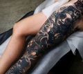 tatuaż na całej nodze dla kobiety