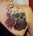 skull rose and clock tattoos