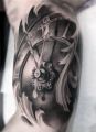 3d clock tattoo on arm