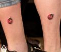 ladybug calf tattoo