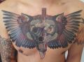 wings tattoo on chest 34