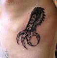Bird claw tattoo