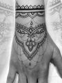 ornamental hand tattoo henna