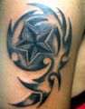 trible tattoo design with star