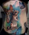 butterfly squirrel tattoo