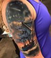 Tattoo ship on the shoulder