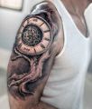 tree clock sleeve tattoo