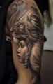 Lion and girl tattoo