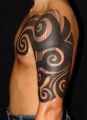 tribal arm tattoo for men