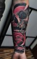 skull and red rose tattoos