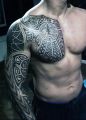 tribal shoulder tattoo for men