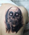 demon tattoo on back