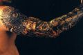 biomechanical arm tattoo 36