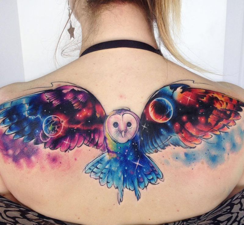 Owl tattoo on her back