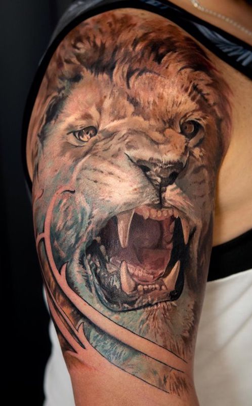 lion arm tattoo