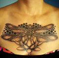 dragonfly tattoo on chest