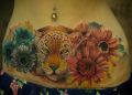 leopard flowers tattoos