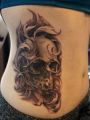 skull rib tattoo design