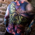 Moth back tattoo