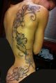 flowers tattoos on her back