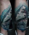 shark tattoo and hands