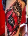 deadpool tattoo on leg