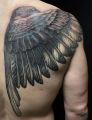 bird tattoo on back for me