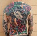 tatuaże konie i róże na plecach