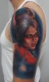 kobieta diabeł - tatuaż na ramieniu